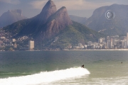 Rio de Janeiro, Brazil. Ipanema Beach. The sugarloaf mountains can be seen in the background