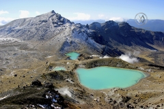 Tongariro National Park, New Zealand. The Tongariro Crossing is often considered to be the finest "one day walk" in New Zealand, if not the world. These are the hidden gems in the center, the Emerald Lakes.