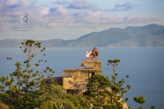 The Forts Walk is a popular activity on Magnetic Island. Travelers climb atop a historic World War 2 fortification to watch the sunset.