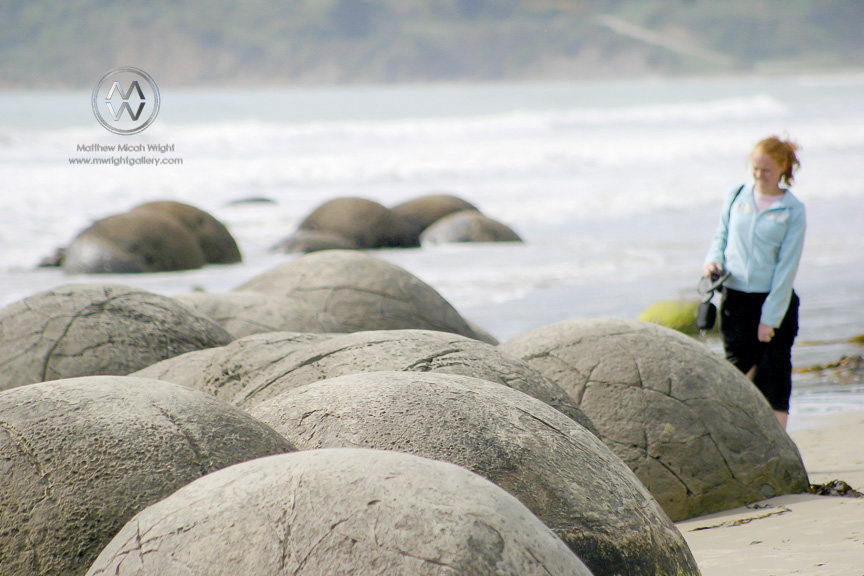 The Moeraki boulders are an unexplained natural rock formation found on the shores of Southern New Zealand. Maori legend tells of the first settlers bringing gigantic food baskets ashore and leaving them on the beach where they eventually became petrified into these enormous round rocks.