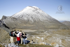 Tongariro National Park, New Zealand. The Tongariro Crossing is often considered to be the finest "one day walk" in New Zealand, if not the world. The trail takes hikers through a volcanic plateau of old lava flows and volcanic craters from Mt. Tongariro, Ruapehu, and Ngauruhoe.