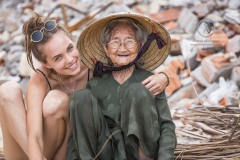 Bai Xep is a quiet remote fishing village off the tourist path, 10km from the major city of Qui Nhon. A tourist meets a local woman hard at work in the village.