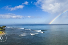 A rainbow over the Hawaiian surf.