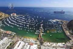 Views over California's famous island; Catalina Island. The famed Casino can be seen in the background. A cruise ship pulls into Catalina Island's, Avalon harbor.