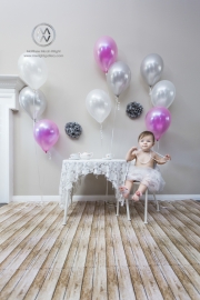 Cali Weathers 1 year cake smash portrait session.