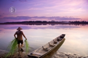 The capital city of Laos. Amazing seafood along the riverside, spectacular temples teeming with brightly clad monks, a decent nightlife and beautiful sunsets. Fishing along the river shores during susnet.