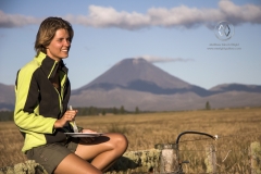 Tongariro National Park, New Zealand. Camping out the back of a campervan in the Tongariro National Park. Mt. Doom can be seen in the background. MR, Model Release